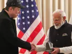 SpaceX CEO Elon Musk presents a special gift to Indian PM Narendra Modi