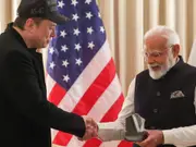 SpaceX CEO Elon Musk presents a special gift to Indian PM Narendra Modi