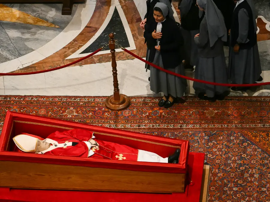 'What a rotten age': Mourners take smiling selfies with Pope Francis' body in casket, triggers outrage