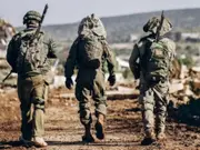 Israel army says attacks continue in Gaza, ceasefire still not in effect