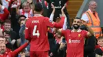 Liverpool clinch record-equaling 20th league title at Anfield with emphatic win over Tottenham