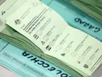 Australians vote in election overcast by prices, Trump tariffs