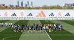 Real Madrid players observe a minute silence for Pope Francis at training