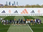 Real Madrid players observe a minute silence for Pope Francis at training