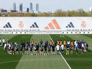 Real Madrid players observe a minute silence for Pope Francis at training