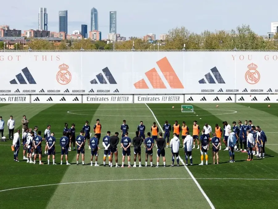 Real Madrid players observe a minute silence for Pope Francis at training