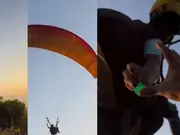 Watch: Paraglider's unbelievable response to man's quirky lighter request in Goa goes viral