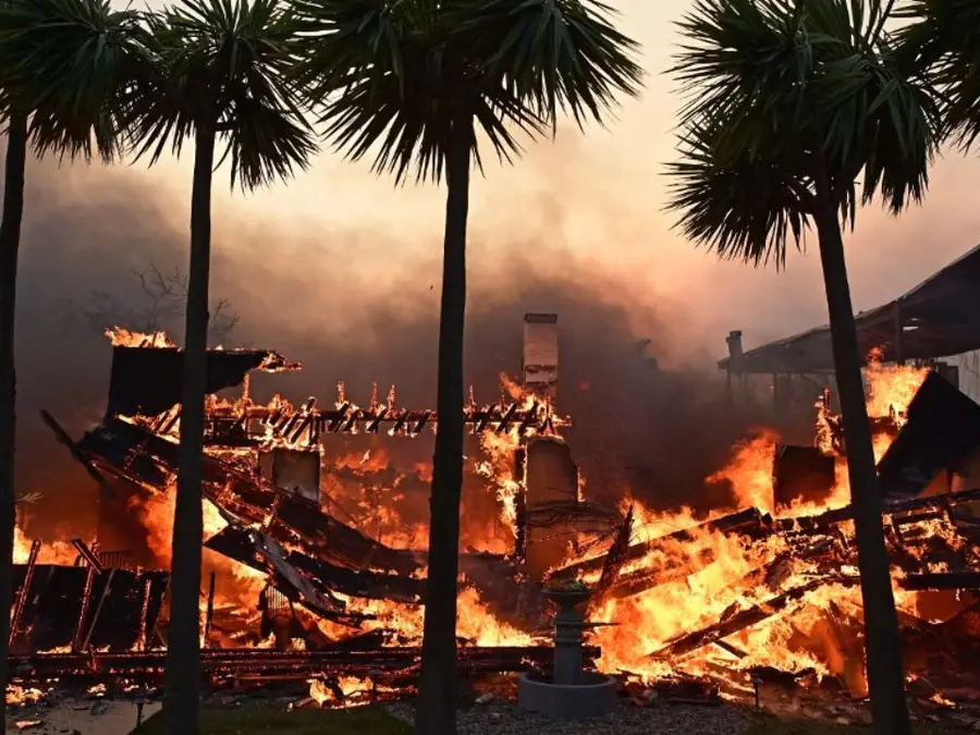 Los Angeles wildfire engulfs Hollywood, Biden cancels Italy trip