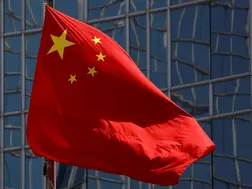 China to 'firmly counter' US trade pressure, says foreign minister