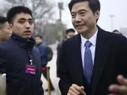 Watch: Xiaomi CEO tosses watermelons to show off 'bulletproof' strength. Guess what happened