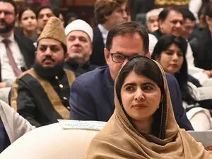 'Overwhelmed' Malala back in Pakistan for girls’ education summit snubbed by Taliban