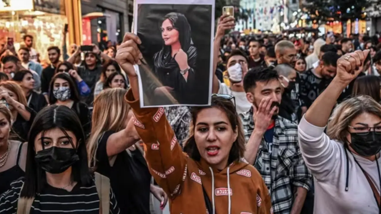 Iran pardons 2 journalists for covering Mahsa Amini's death that sparked nationwide protest
