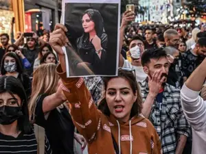 Iran pardons 2 journalists for covering Mahsa Amini's death that sparked nationwide protest