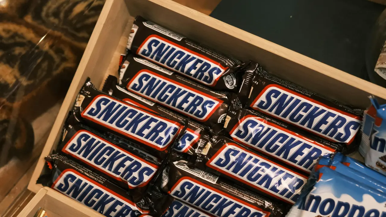 British man buried in Snickers-themed coffin as family fulfils his unusual last wish