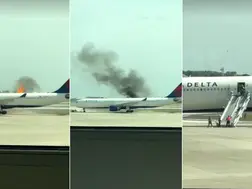 Dramatic video shows Delta plane's engine on fire in Orlando, forcing passengers to evacuate