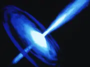 Supermassive black hole 12,500,000,000 light-years away is shooting jets towards Earth. What does it mean?