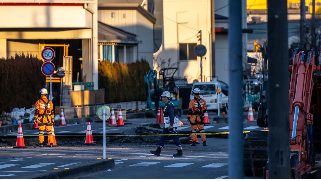 Rescue efforts intensify in Japan to reach driver trapped in sinkhole for days