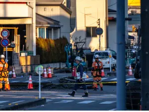 Rescue efforts intensify in Japan to reach driver trapped in sinkhole for days