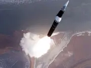North Korean leader Kim Jong Un warns new missile will 'reliably contain any rival'