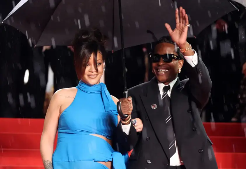 Rihanna braves the rain for partner ASAP Rocky's Highest 2 Lowest premiere at Cannes