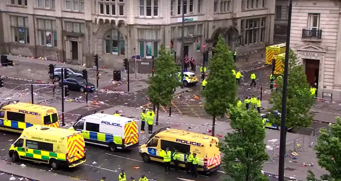 Car ploughs into people celebrating Liverpool's title parade; police make arrest
