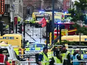 Football unites after car ploughs into Liverpool victory parade