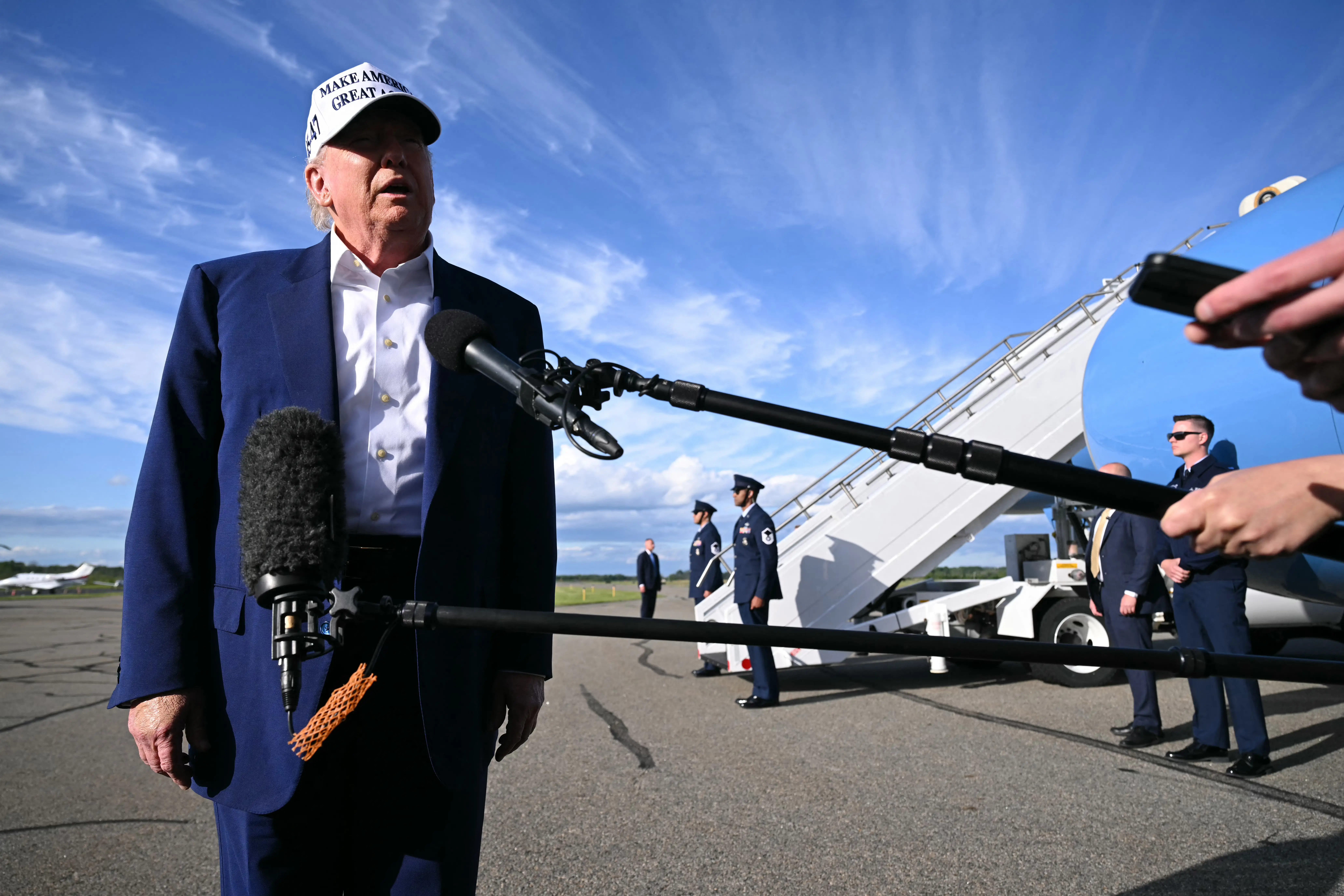 Frustrated Trump calls a reporter "you're fake news" when asked what he was going to do about Vladimir Putin