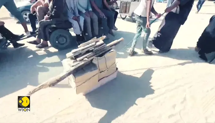  Israel allows very limited aid in Gaza, starved Palestinians rush for food 