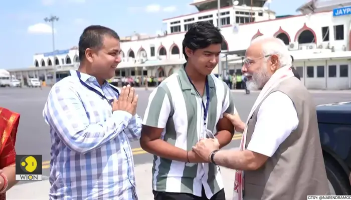  PM Narendra Modi meets young cricketer Vaibhav Suryavanshi and his parents at Patna airport 