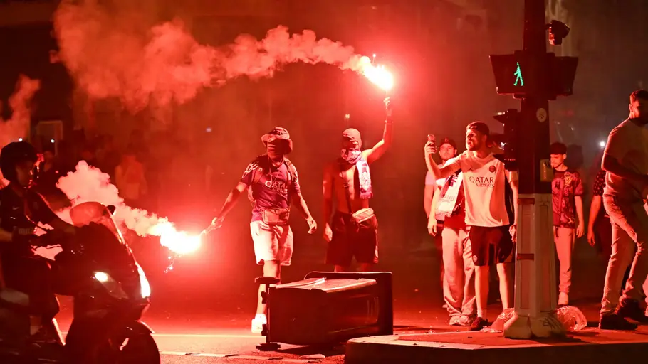 Two dead, hundreds arrested in Paris after fan violence overshadows PSG's Champions League triumph