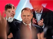 Polish nationalist Nawrocki wins presidency with narrow margin; major blow to pro-EU government