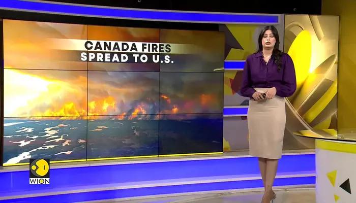  Canada: Wildfires force 27,000 to evacuate 