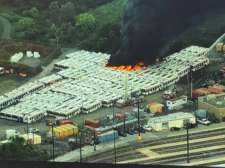 Nearly two dozens SEPTA buses on fire in Philadelphia's Nicetown-Tioga region, thick smoke visible across city