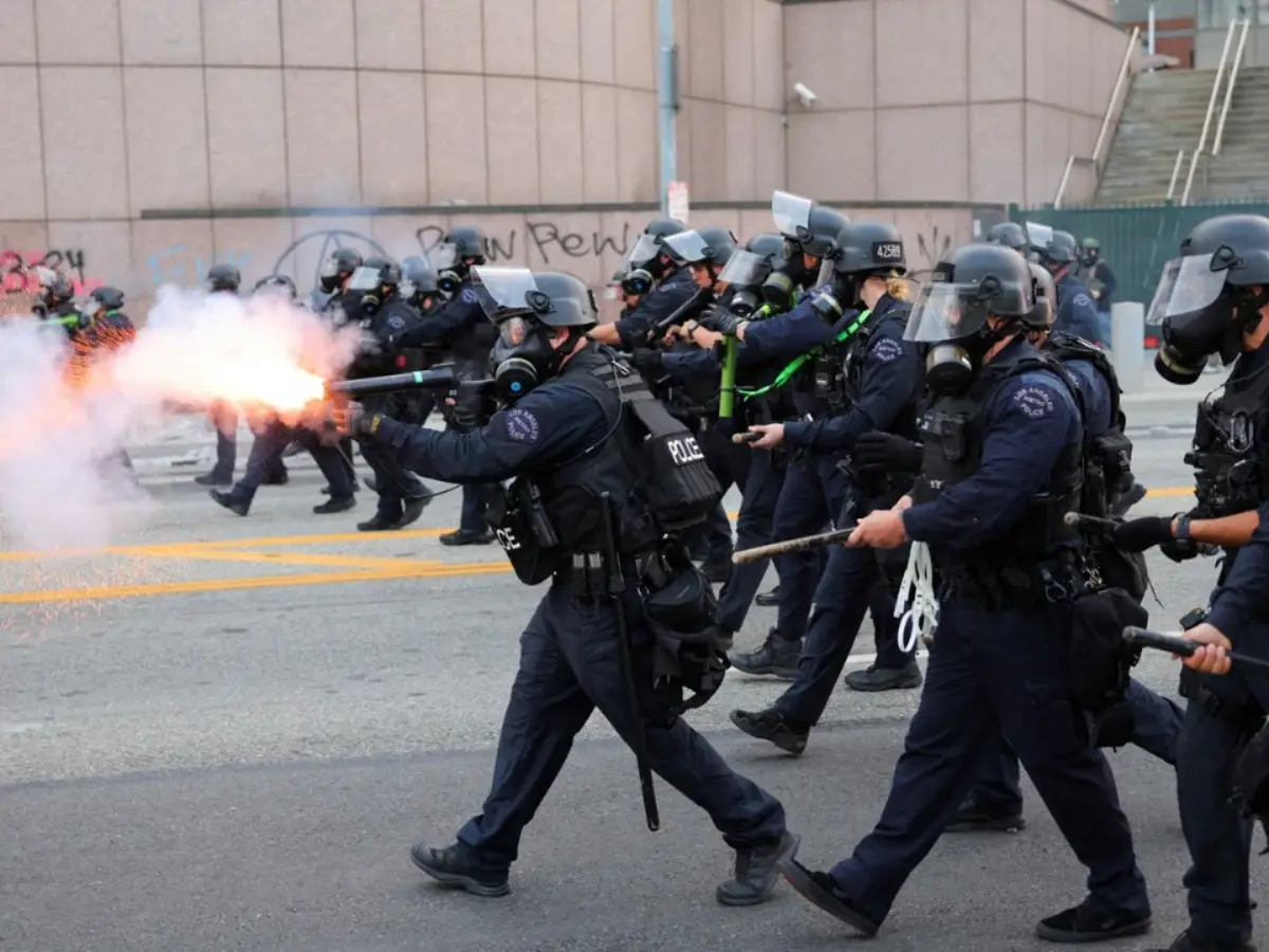 Tense confrontation between protesters and police