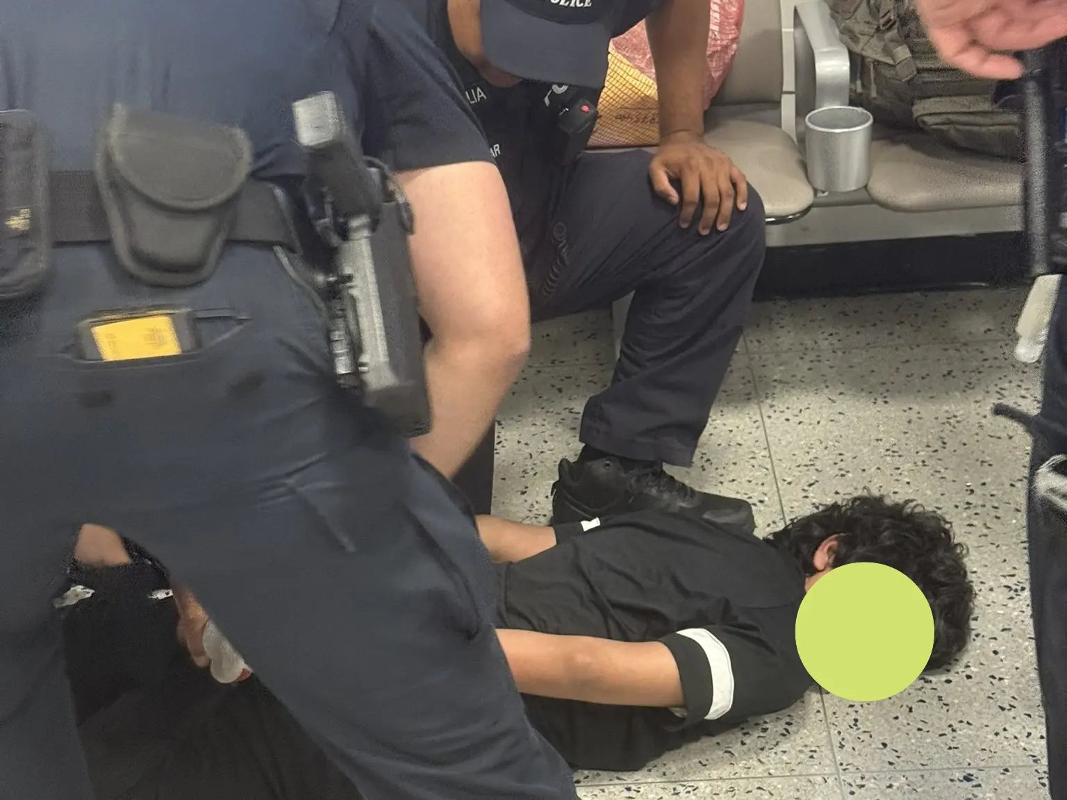 Indian student pinned to ground by officials at US airport, handcuffed and deported Indian student pinned to ground by officials at US airport, handcuffed and deported