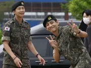 BTS members RM and V discharged from mandatory military service