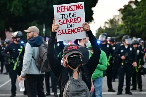 Tensions flare up between police and demonstrators as immigration protests spread to Dallas