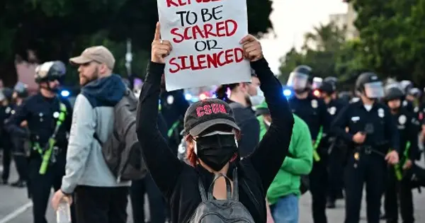 Tensions flare up between police and demonstrators as immigration protests ...