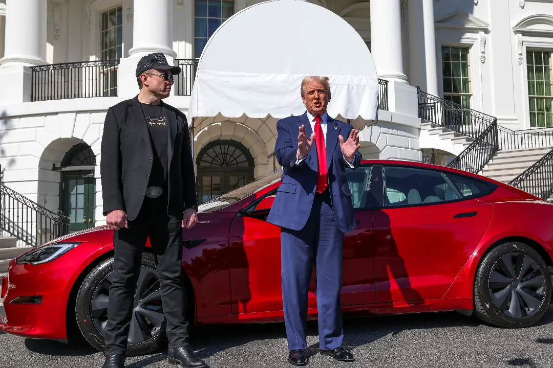 Trump is NOT selling his red Tesla, says he has 'a lot of locations' to park it