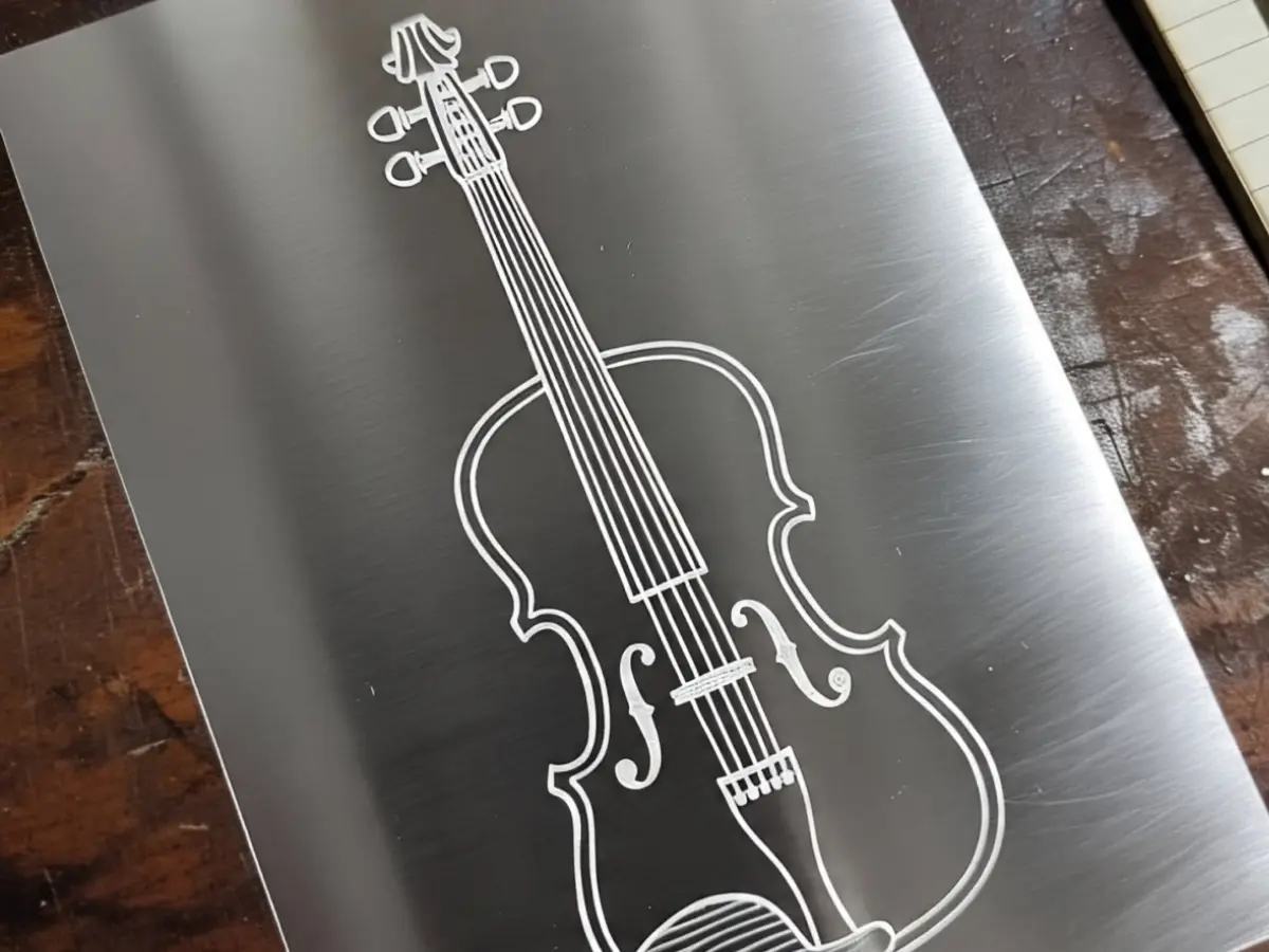 Scientists have created a violin the size of a speck of dust. Can you play it?