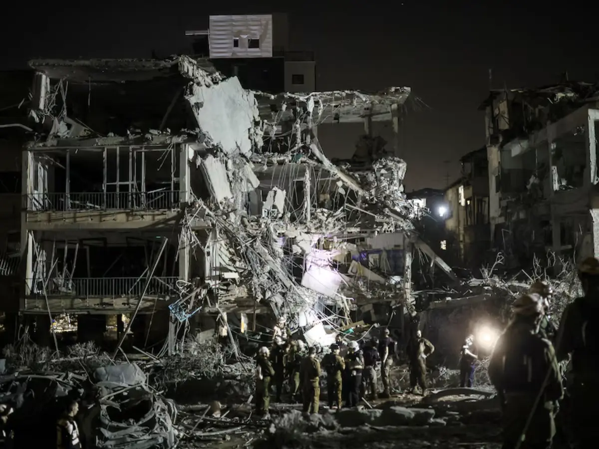 Rescue and security personnel at work following missile attack from Iran on Israel's Ramat Gan