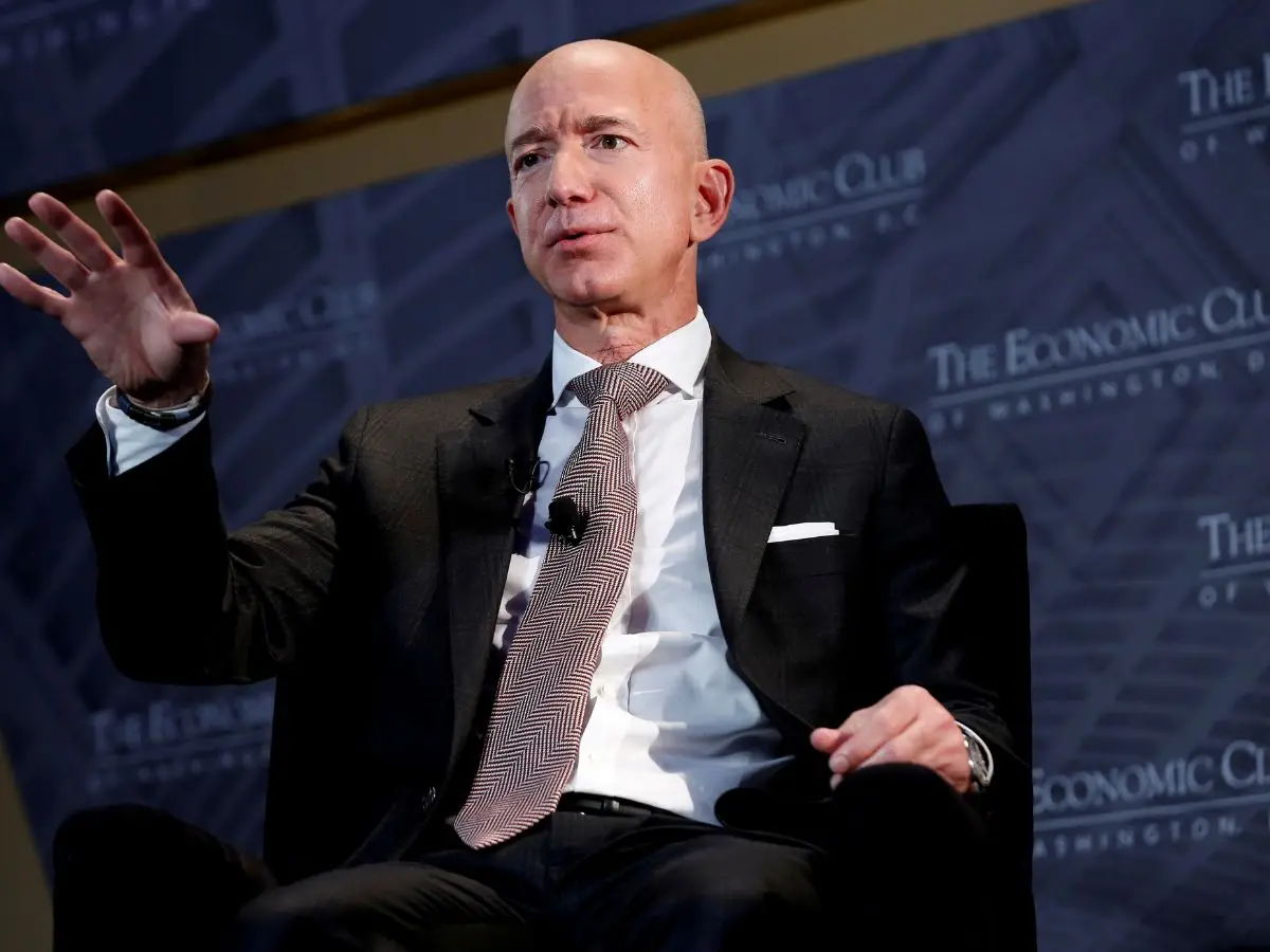 Bezos Falls to Third Place