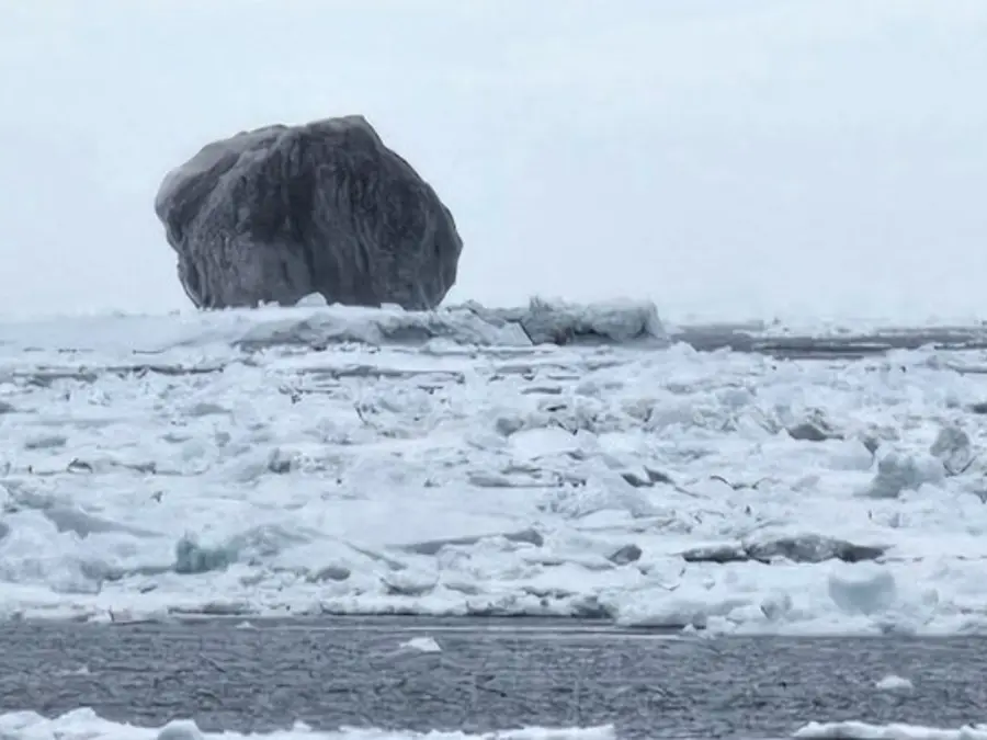 Black iceberg with 100,000-year-old ice and veins spotted in Canada. Expert shares likely reason