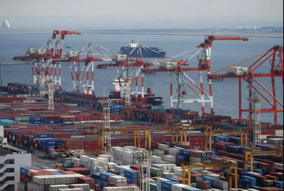 Japan’s exports fall for first time in 8 months as US tariffs bite into recovery