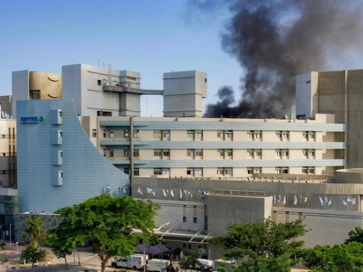 Smoke billows from a building at Soroka Hospital in Beersheba in southern Israel