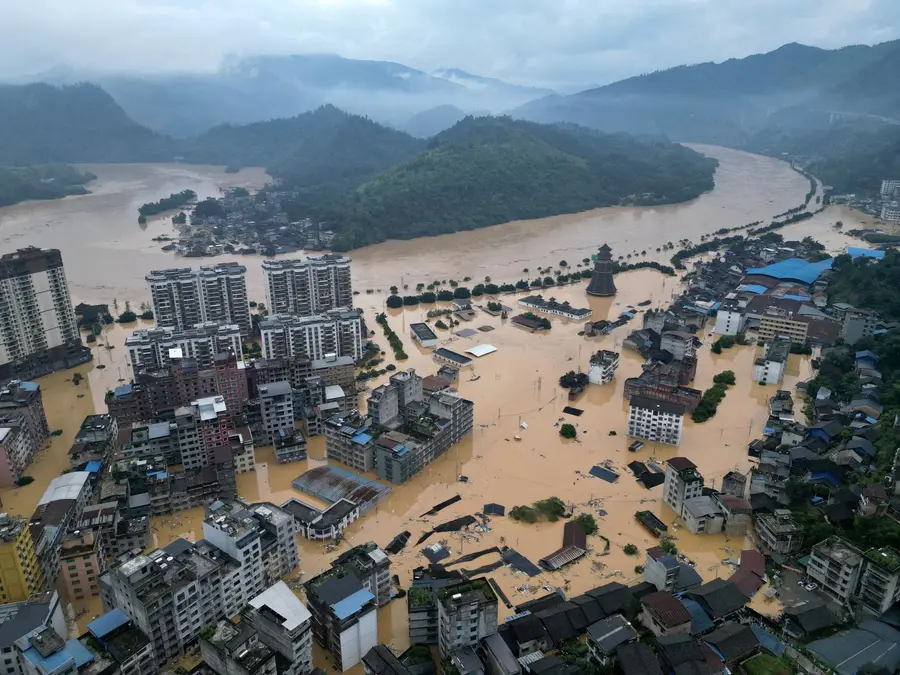 China expands flood compensation as extreme rain triggers social tensions