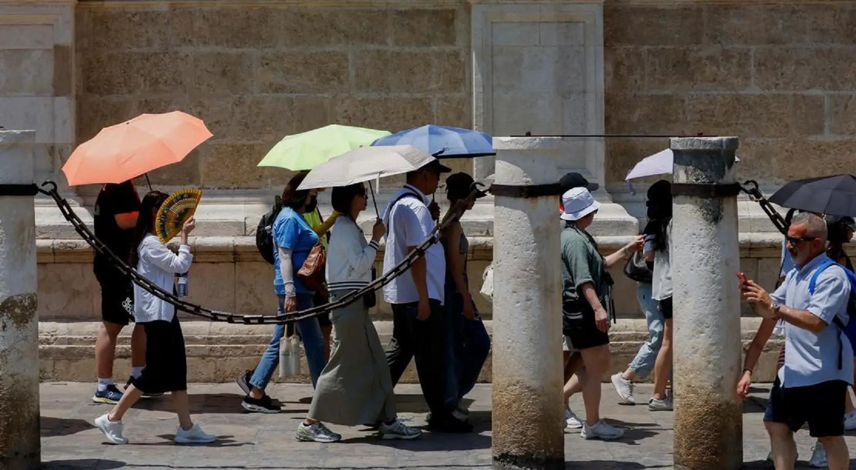 Europe bakes as heatwave breaks records; nations issue red alerts, mull work bans