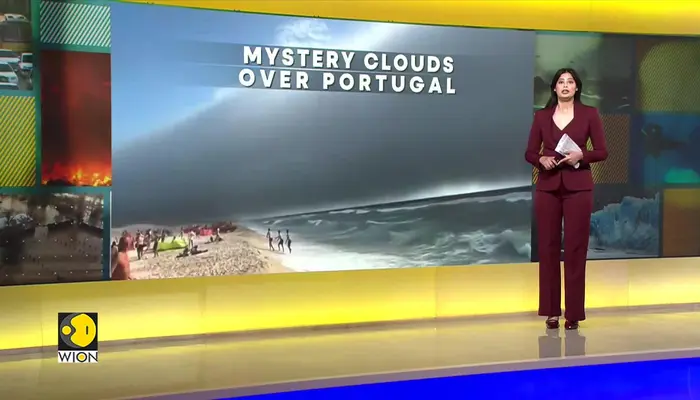  Rare roll cloud stuns Portugal beaches 