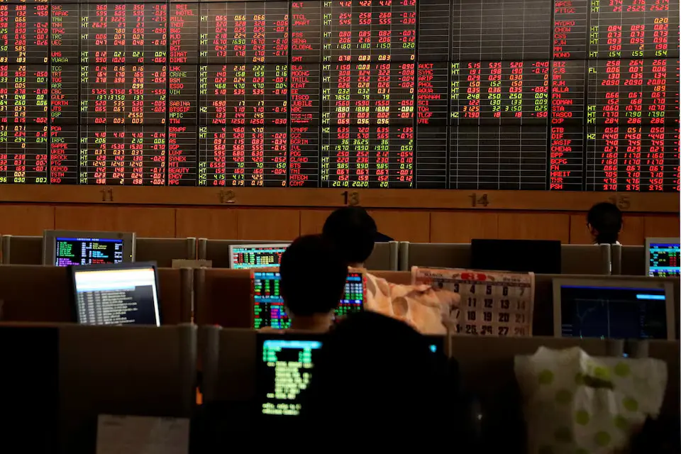 Asian markets edge higher, gold shines as investors await US policy clarity