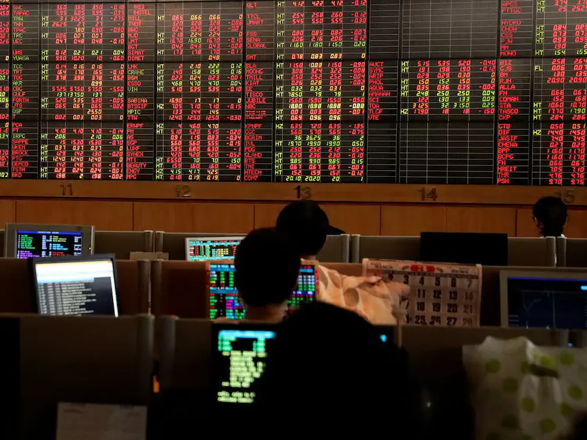Asian markets edge higher, gold shines as investors await US policy clarity